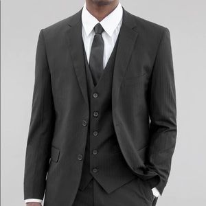 Black tone on tone 3-piece suit. Size 48L